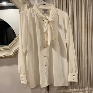 H & M blouse. Gold button down buttons. Chiffon. Bow at neck. Size 12. Elegant.